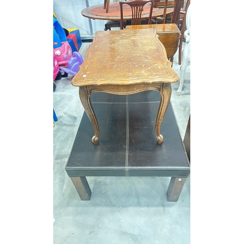 81 - Set of three Ercol vintage nesting tables in dark wood, featuring curved edges and sturdy constructi... 