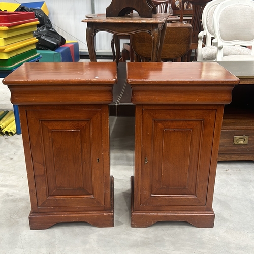 82 - Pair of vintage wooden CONSORZIO MOBILI FURNITURE pedestals with rich cherry finish, featuring decor... 