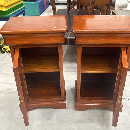 82 - Pair of vintage wooden CONSORZIO MOBILI FURNITURE pedestals with rich cherry finish, featuring decor... 