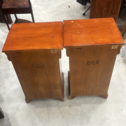 82 - Pair of vintage wooden CONSORZIO MOBILI FURNITURE pedestals with rich cherry finish, featuring decor... 