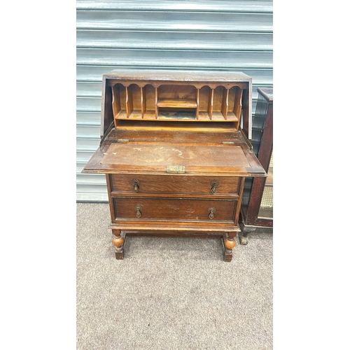 85 - Mahogany display cabinet with glass doors and brass handles, featuring cabriole legs from the early ... 