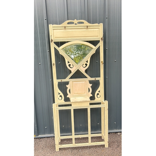 90 - Victorian wooden hall stand with mirror features intricate scrollwork and a distressed cream finish.... 