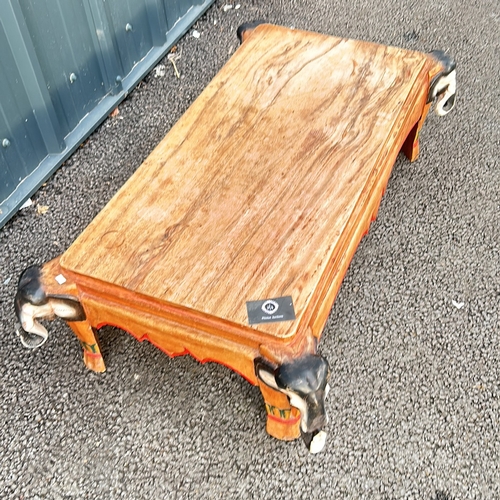 92 - Hand-carved Indian Hardwood wooden low table with intricate elephant head motifs on each corner. - I... 