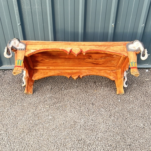 92 - Hand-carved Indian Hardwood wooden low table with intricate elephant head motifs on each corner. - I... 