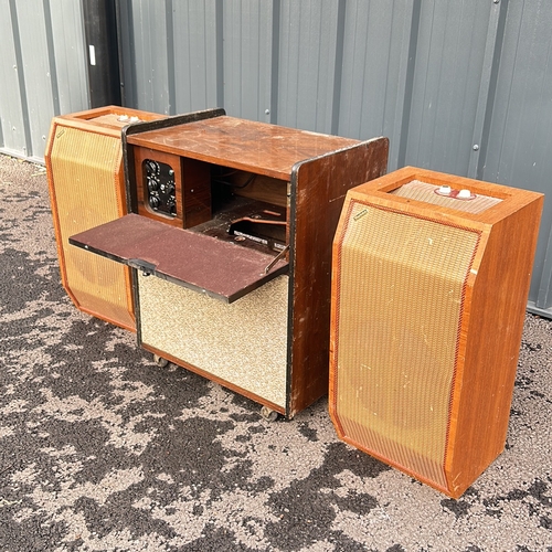 364 - Vintage wooden radiogram unit, featuring mid-century design elements. It includes a central unit wit... 