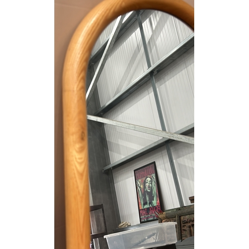 109 - Rectangular arched mirror features a natural pine wood frame and MDF backing, with sleek modern desi... 