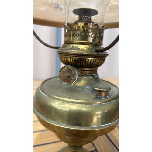 348 - Antique brass oil lamp with etched glass shade, featuring intricate floral patterns. From the late 1... 