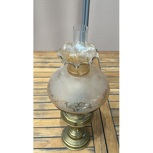 348 - Antique brass oil lamp with etched glass shade, featuring intricate floral patterns. From the late 1... 