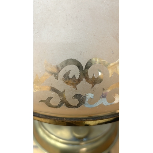 348 - Antique brass oil lamp with etched glass shade, featuring intricate floral patterns. From the late 1... 