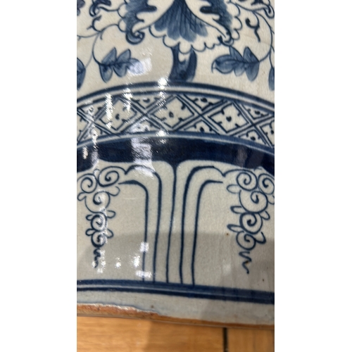 349 - Large Blue and white Chinese Ming Style ceramic lamp with floral motifs and a beige shade. It featur... 