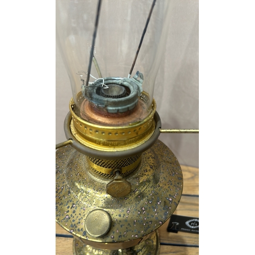 350 - Aladdin brass oil lamp with glass chimney and white glass shade, Model 23.