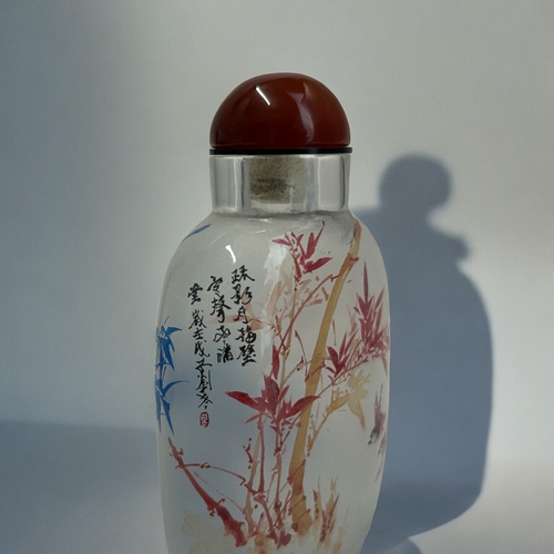 30 - A Chinese Inside Painted glass snuff bottle.Painted Bamboo in blue with flying birds. Red bamboo sce... 