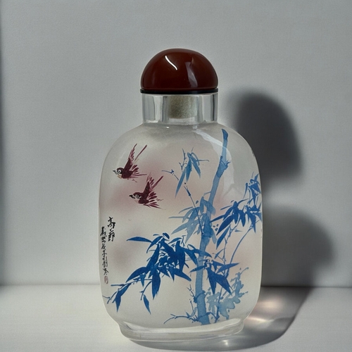 30 - A Chinese Inside Painted glass snuff bottle.Painted Bamboo in blue with flying birds. Red bamboo sce... 