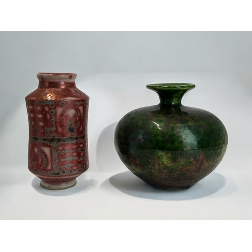 314 - A Russell Akerman Raku glaze pottery vase.Squat form, with green & copper glaze. Signed to base.... 