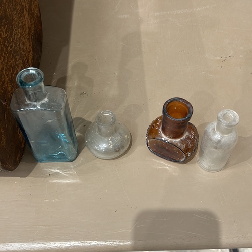 331 - Collection of vintage glass bottles, including various shapes and colors , Together with a small vin... 