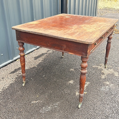 119 - Good Victorian mahogany Partners Desk writing table with four drawers and turned legs on brass caste... 