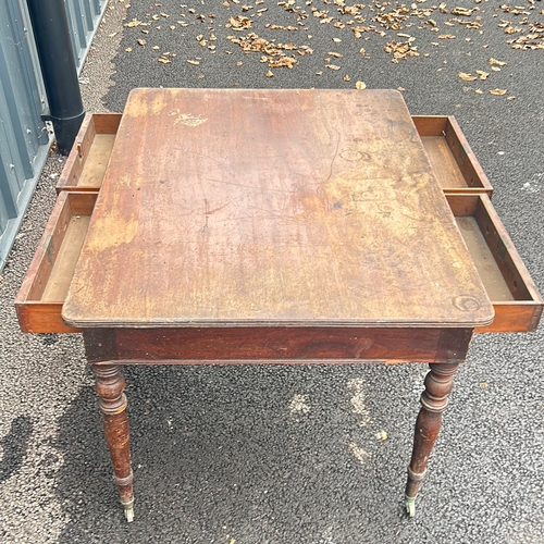 119 - Good Victorian mahogany Partners Desk writing table with four drawers and turned legs on brass caste... 