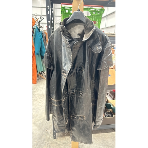 283 - Vintage black Yarmouth PVC waxed raincoat with corduroy collar and double-breasted button closure. L... 