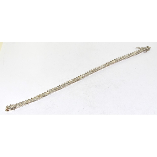 283 - 9ct white gold fancy tennis line bracelet 11g 18cm long 