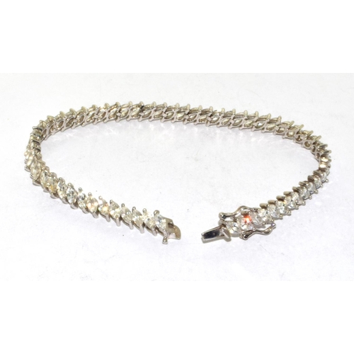 283 - 9ct white gold fancy tennis line bracelet 11g 18cm long 