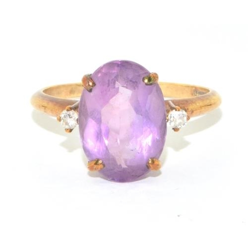 133 - 9ct gold ladies Amethyst statement ring set with Diamond to the shoulders size R