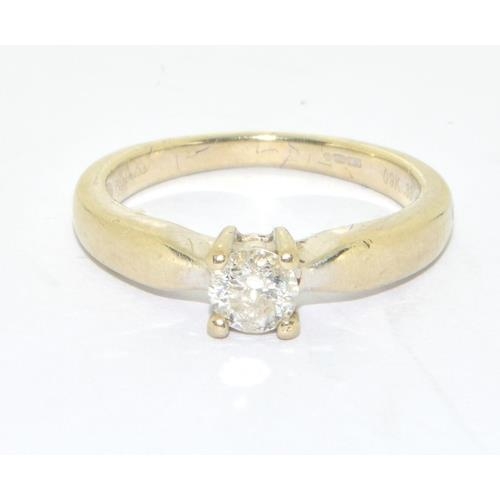 173 - 9ct gold ladies Diamond solitaire ring hallmarked in the ring as 0.33ct size L