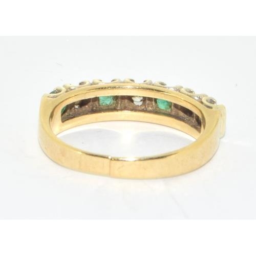 193 - 9ct gold ladies Diamond and Emerald 1/2 eternity ring hallmarked as 0.25ct size L