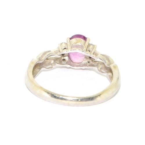 83 - 9ct white gold ladies Pink Tourmaline and Diamond ring on a open work setting size M