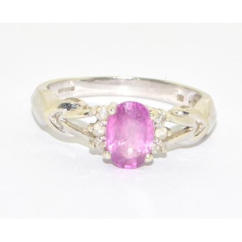 83 - 9ct white gold ladies Pink Tourmaline and Diamond ring on a open work setting size M