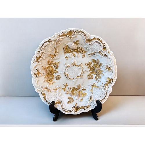 317 - A Meissen porcelain Gilded cabinet plate.19th centuryRelief moulded & gilded foliate design.Diam... 