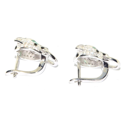 149 - Pair silver designer earrings with emerald eyes