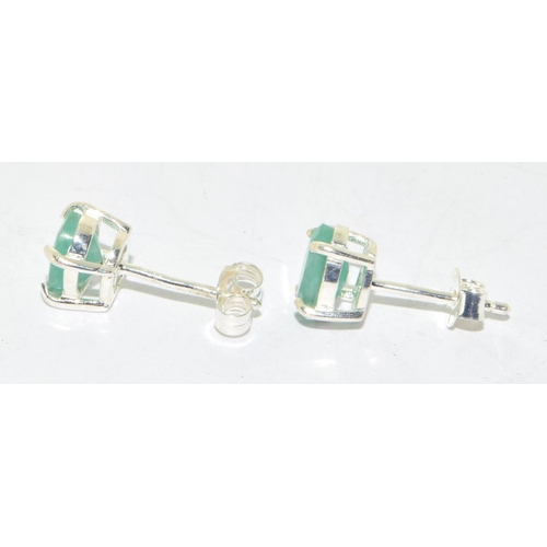 284 - Pair emerald stud earrings on silver posts