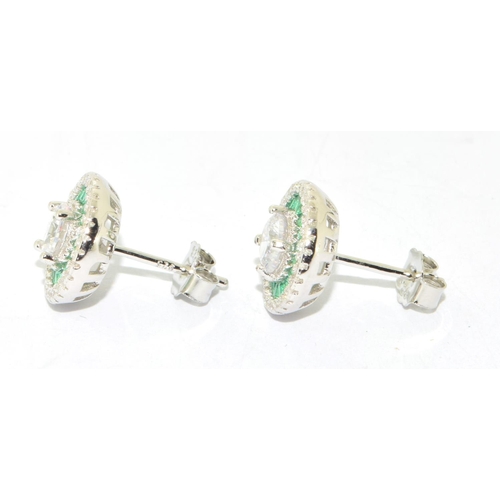 303 - Pair silver emerald cluster earrings