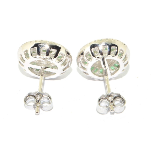 303 - Pair silver emerald cluster earrings