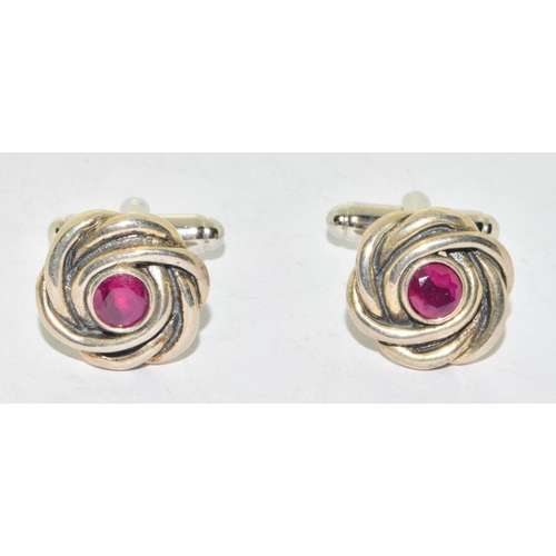 329 - Pair silver and garnet cufflinks boxed