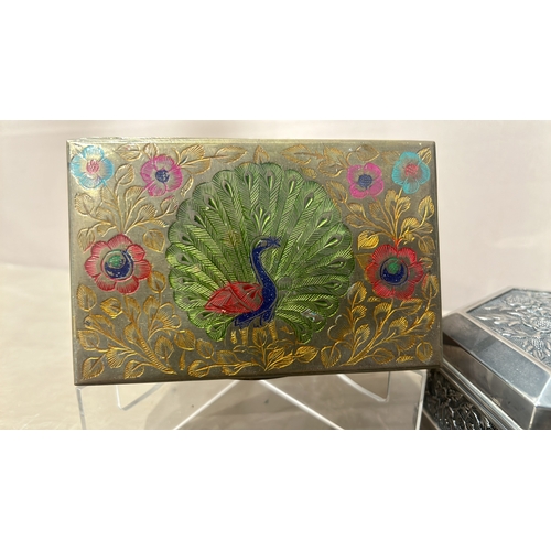 54 - Collection of decorative metal boxes, featuring intricate engravings and diverse designs, including ... 