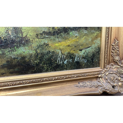 180 - Large gilt framed Oil painting signed by artist. Features a detailed landscape scene with lush green... 