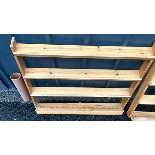 123 - Pair of wooden wall-mounted shelves, featuring three tiers each, crafted from light stained pine.