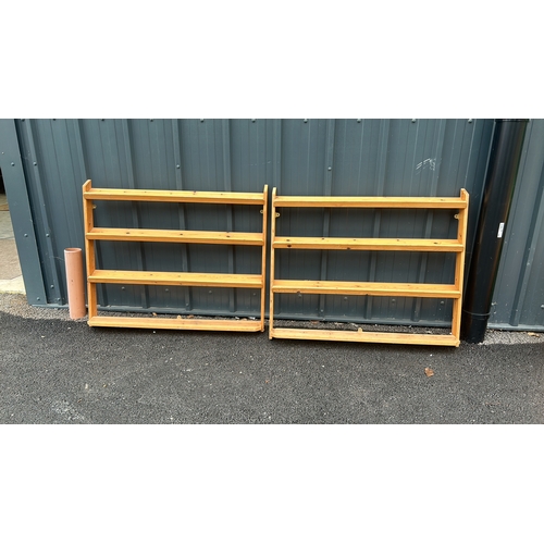 123 - Pair of wooden wall-mounted shelves, featuring three tiers each, crafted from light stained pine.