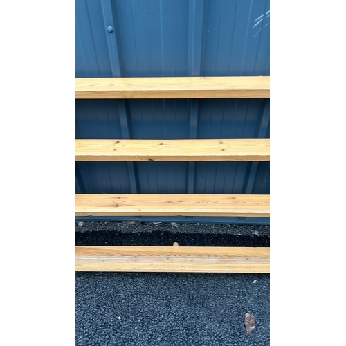 123 - Pair of wooden wall-mounted shelves, featuring three tiers each, crafted from light stained pine.