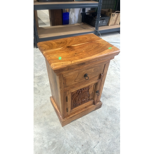 290 - Wooden bed side cabinet featuring Hand-carved intricate elephant motifs central panel. Indian Hard W... 