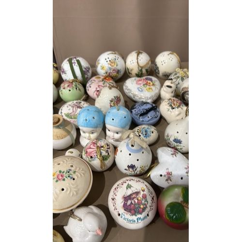 217 - A Large Porcelain pomander collection features various floral and figural designs with Taylor of Lon... 