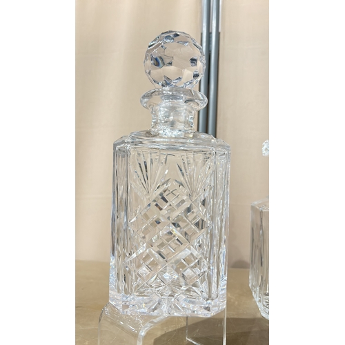 335 - Webb Corbett crystal Cut glass decanter with intricate geometric pattern. Accompanied by a Crown Sta... 