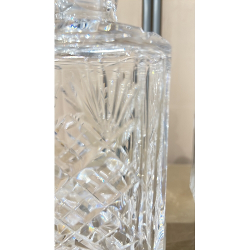 335 - Webb Corbett crystal Cut glass decanter with intricate geometric pattern. Accompanied by a Crown Sta... 