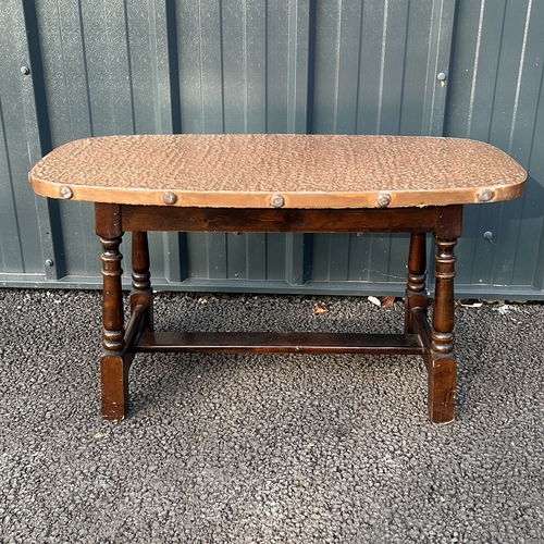 57 - Vintage wooden copper topped coffee table. From the early to mid-20th century.