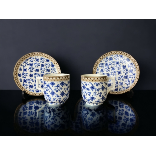 570 - Two Christopher Dresser for Brownfield Teacups & saucers.Brown & blue sprig patter, C1884.Th... 