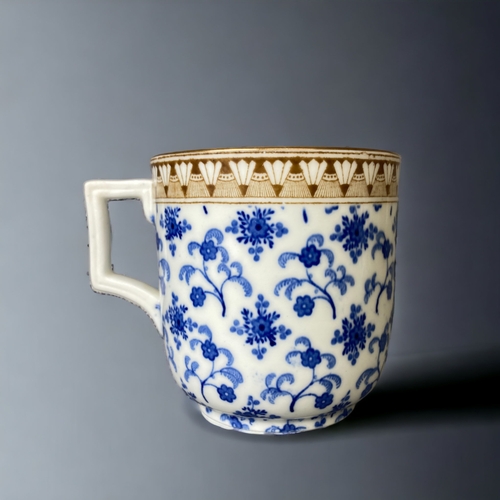 570 - Two Christopher Dresser for Brownfield Teacups & saucers.Brown & blue sprig patter, C1884.Th... 