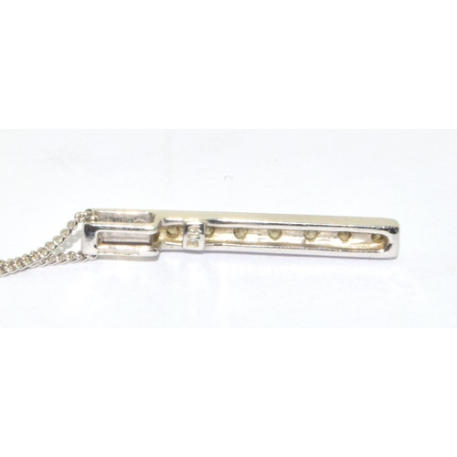 11 - 9ct white gold Diamond bar pendant and 42cm chain