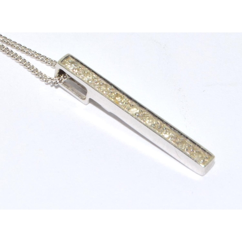 11 - 9ct white gold Diamond bar pendant and 42cm chain