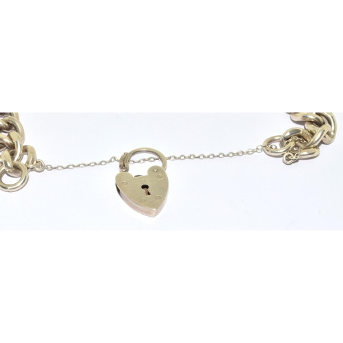 12 - Good solid 925 silver ladies bracelet with a heart padlock and safety chain 31g